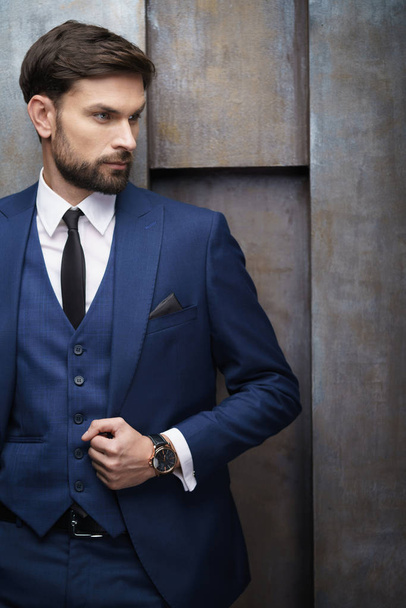 indoor photo of young handsome stylish businessman wearing suit - Fotografie, Obrázek