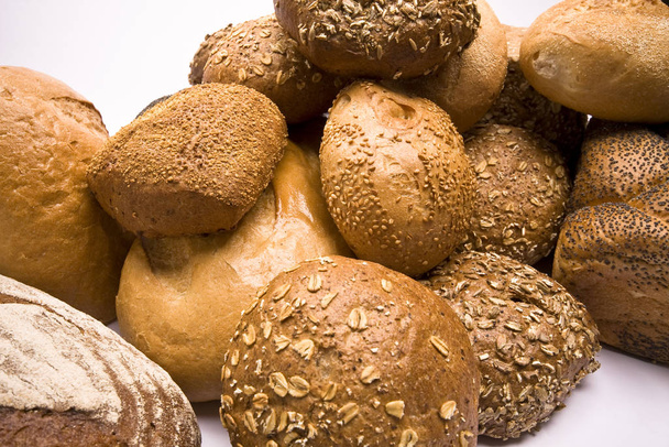 fresh baked bread on a wooden table - Φωτογραφία, εικόνα