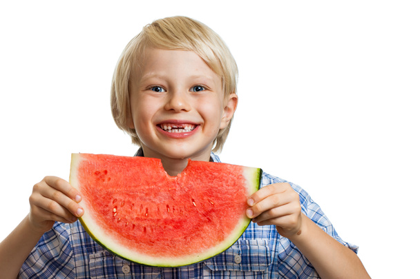 Cute happy laughing boy eating water melon - Foto, afbeelding