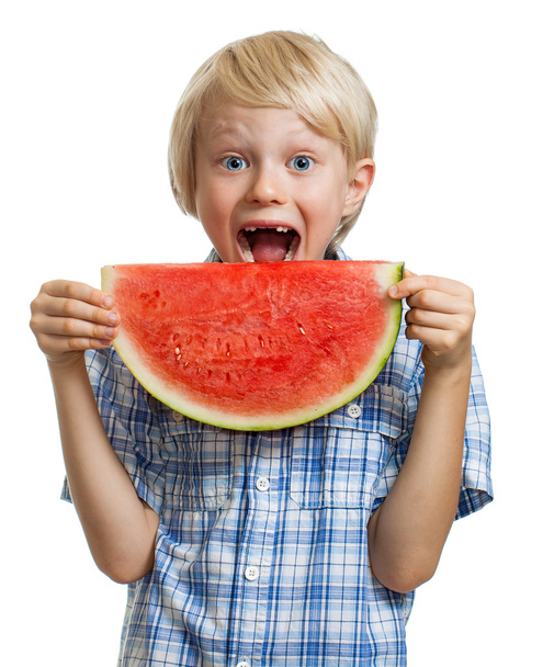 Boy taking bite of water melon - Fotoğraf, Görsel