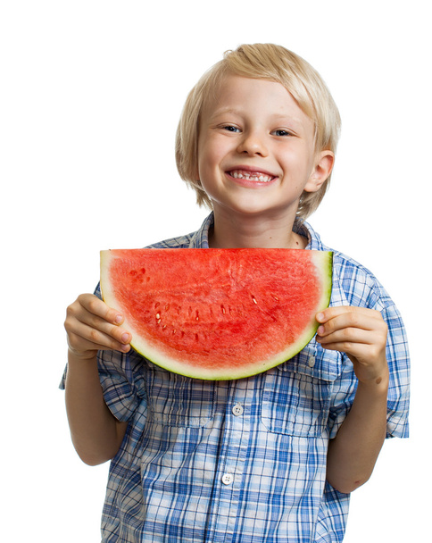 Cute boy holding slice of water melon - Photo, Image