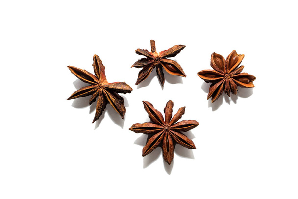Fragrant anise isolated on a white background. Stars of dried flavorful anise isolated on a white background - Fotoğraf, Görsel