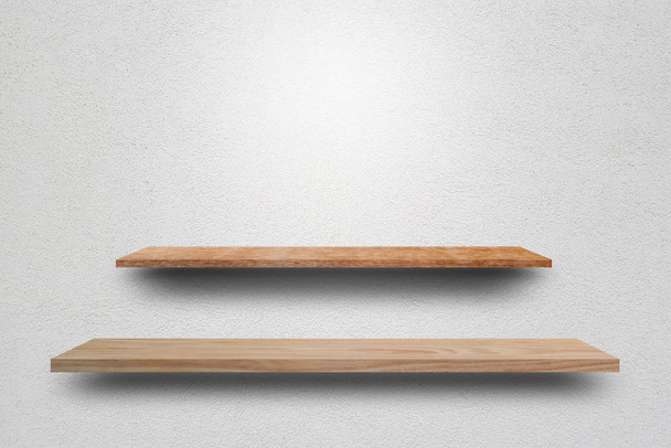 Vooraanzicht lege houten plank en grijze muur. Ontwerpconcept - Foto, afbeelding