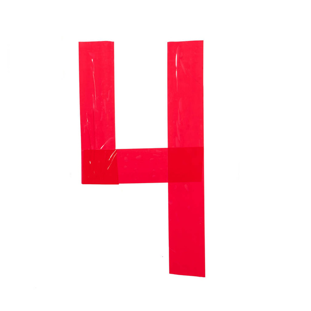 Номер четыре сделан из красного скотча на белом фоне
 - Фото, изображение
