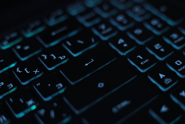 fond macro multicolore lumineux clignotant bouton vidéo clavier portable noir technologie clignotement
 - Photo, image