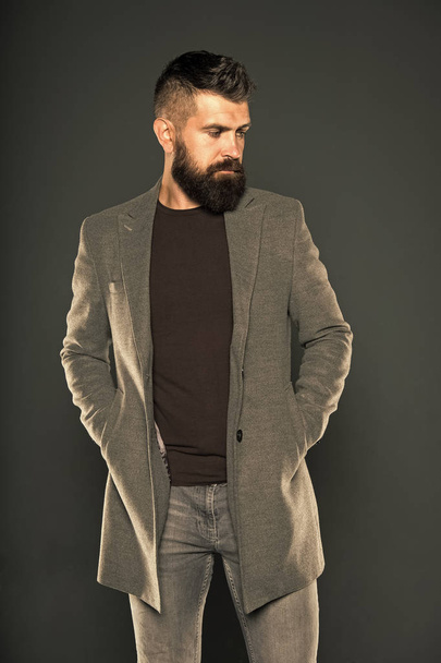 Daily outfit. Fall fashion. Maintaining masculine look. Brutal hipster man. Hipster wearing casual clothes. Hipster with beard hair and stylish haircut. Bearded man trendy hipster style. Warm jacket - Foto, afbeelding