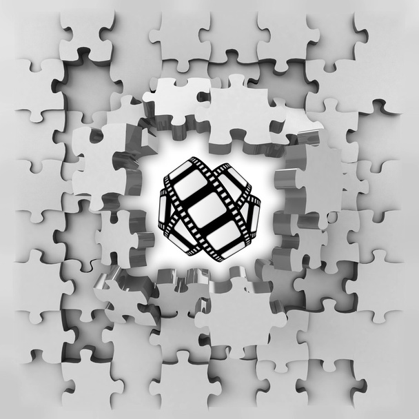 grijze puzzel puzzel met film tape openbaring - Foto, afbeelding