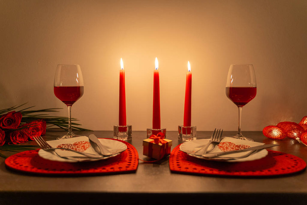 Romantic table with candles and wine for Valentines day - Photo, Image