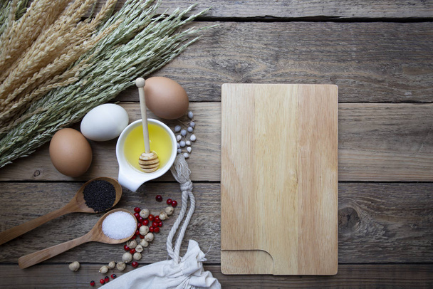 Food ingredients , kitchen utensils for cooking on wooden backgr - Fotografie, Obrázek