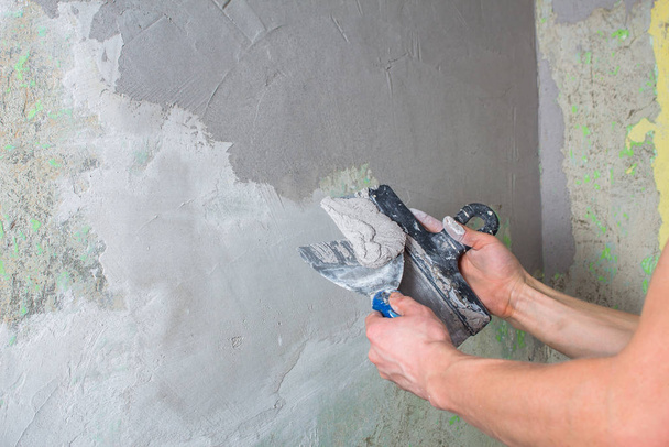 Repair the wall. Plaster the wall with a spatula. Internal const - Photo, Image