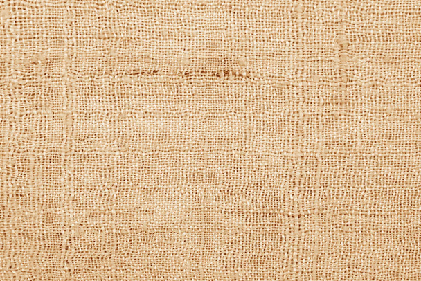 текстура коричневой льняной ткани или фон
. - Фото, изображение