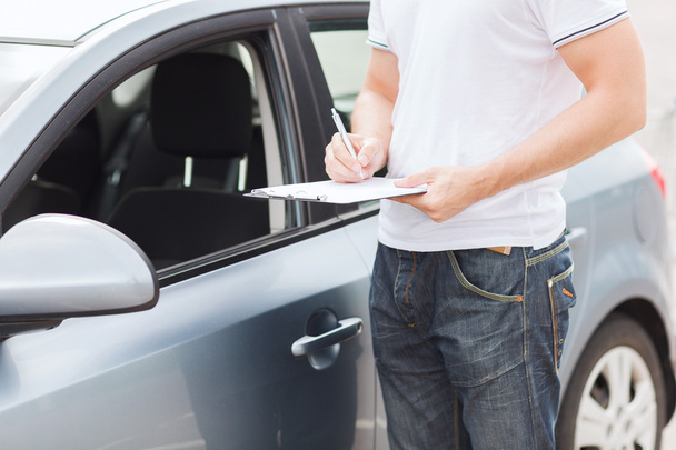 Man with car documents - Photo, Image