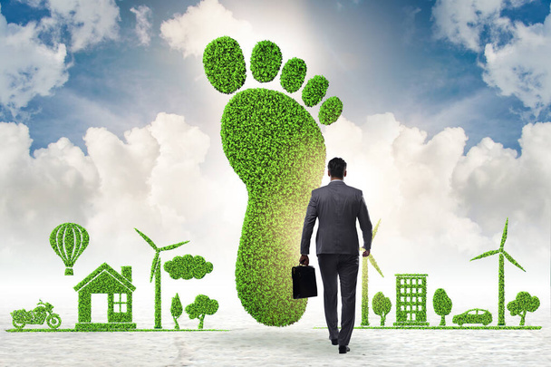 ビジネスマンと二酸化炭素排出量の概念 - 写真・画像