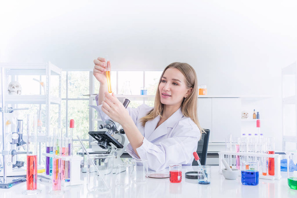 pretty scientist work reserching in chemical laboratory - Фото, изображение