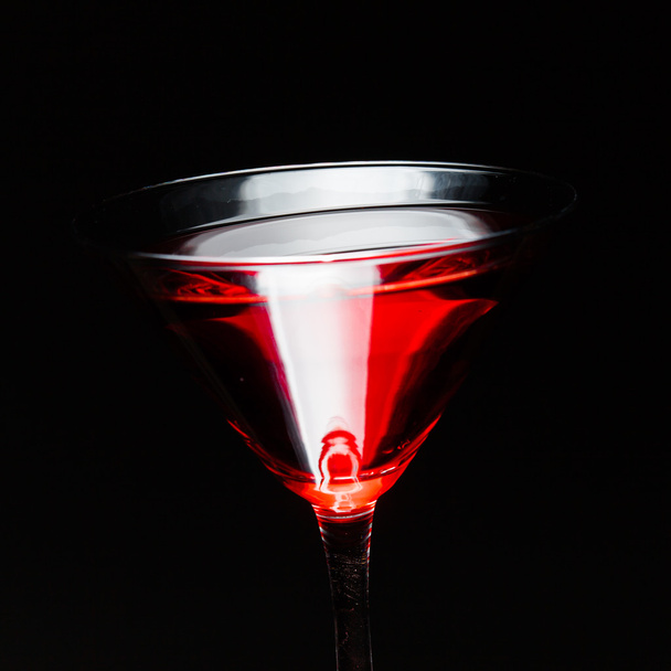abstract red martini cocktail on black - Foto, Imagen