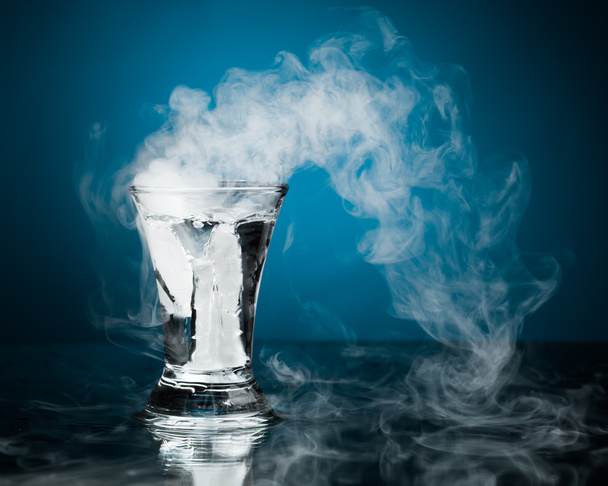 shot glass of vodka with ice vapor - Photo, image