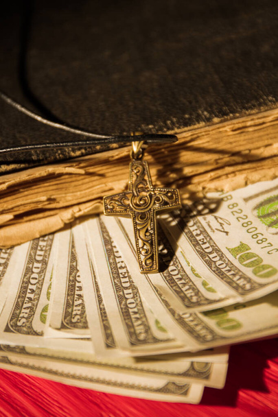 Money in book, church tethe concept. - Фото, зображення