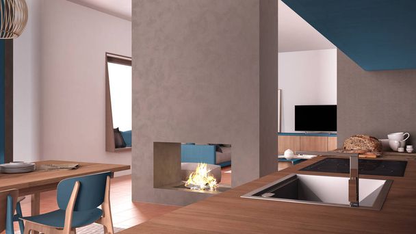 ダイニングテーブルと椅子、コンクリート現代的な暖炉と壁、ソファ、テラコッタタイルの床、現代的なインテリアデザインのリビングルームと居心地の良い青と木製のキッチン - 写真・画像