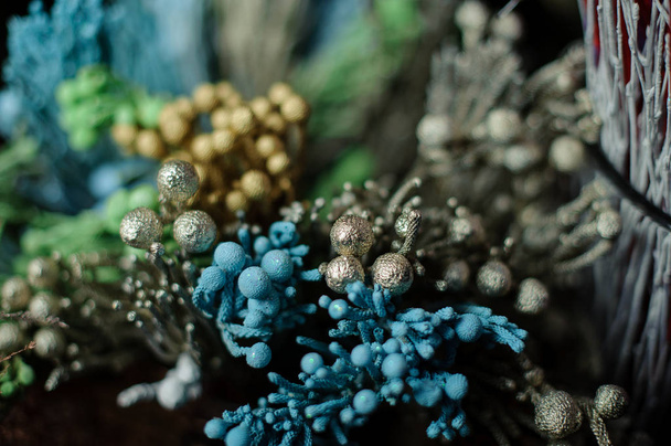 Bouquet of glittered blue, freen golden and siver decoration - Foto, imagen