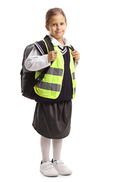 Female pupil wearing a safety vest  - Foto, imagen