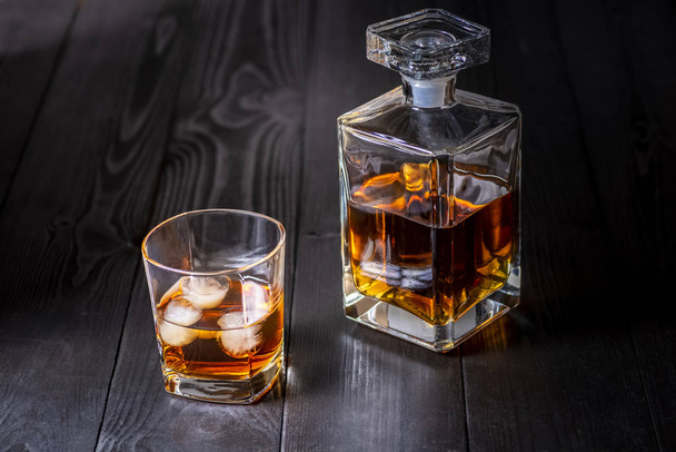 carafe and glass with whiskey - Фото, зображення