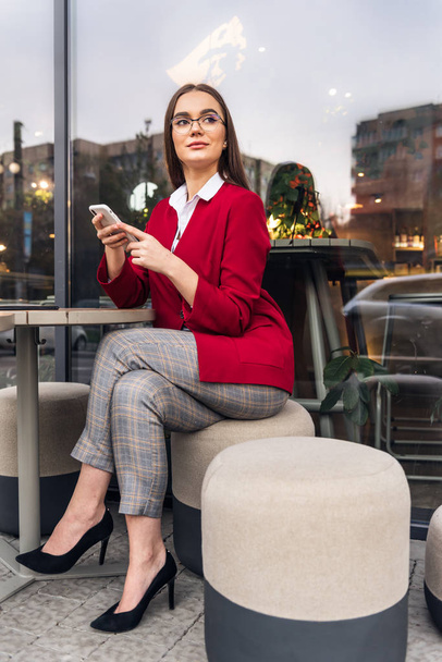 Modern businesswoman working outdoors. Happiness and technology. - Фото, зображення