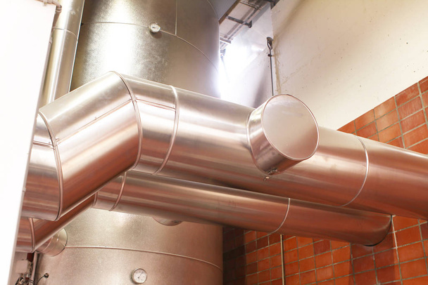 chrome pipes in heating and AC rooms in buildings of factories a - Photo, Image