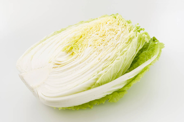 Napa cabbage half on white background - Photo, Image