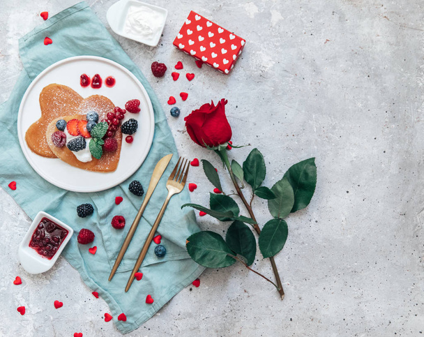Valentine's Day heart shapes pancake with berries.. morning breakfast with coffee and pancakes - Photo, image