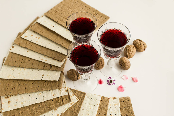 close-up shot of matzah bread and red wine for Passover Feast  - Photo, Image