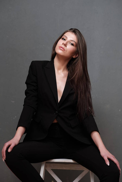 studio portrait of beautiful young brunette woman  - Fotografie, Obrázek