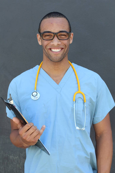 close-up portrait of handsome young african american doctor with stethoscope - Zdjęcie, obraz