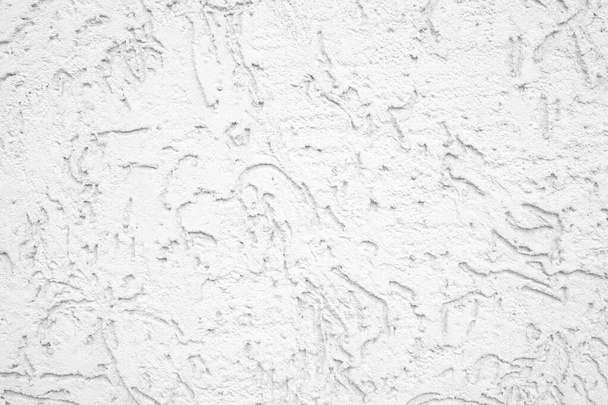 Fehér durva vakolt fal készen áll a festésre. Az építési, építészeti és tervezési témák háttere - Fotó, kép