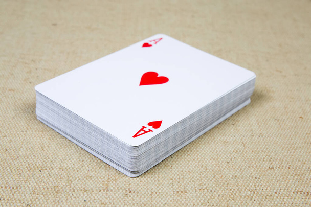 Deck of playing cards with ace hearts card on top - Foto, imagen
