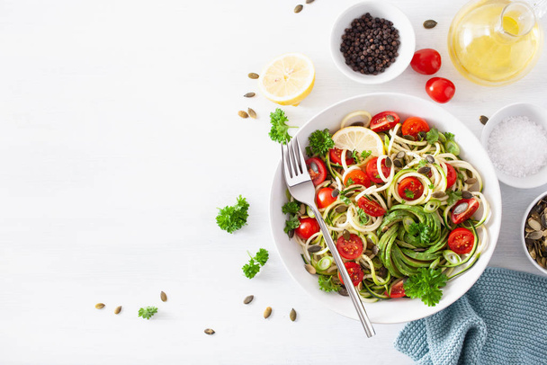 vegan ketogenic spiralized courgette salad with avocado tomato p - Photo, Image