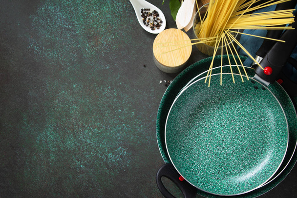 Set New Empty fry pan with ceramic coatingon on a stone kitchen  - Photo, Image