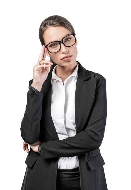 Thoughtful young businesswoman with glasses - Foto, Imagen