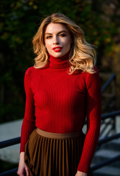 Femininity and tenderness. Autumn stylish outfit. Fall fashion. Woman walk in autumn park. Cozy knitwear. Knitted sweater. Adorable girl enjoy sunny autumn last sunbeams. Fashionable clothes - Foto, Imagen