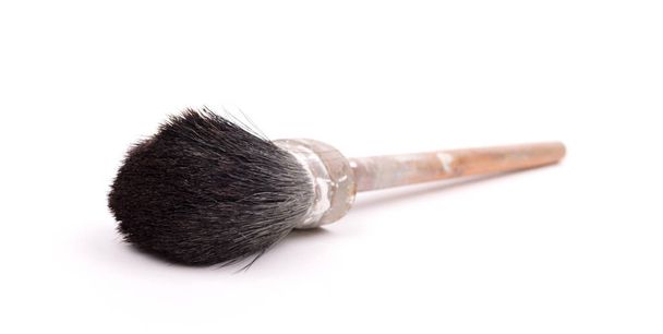 Old paintbrush isolated on a white background - Fotoğraf, Görsel