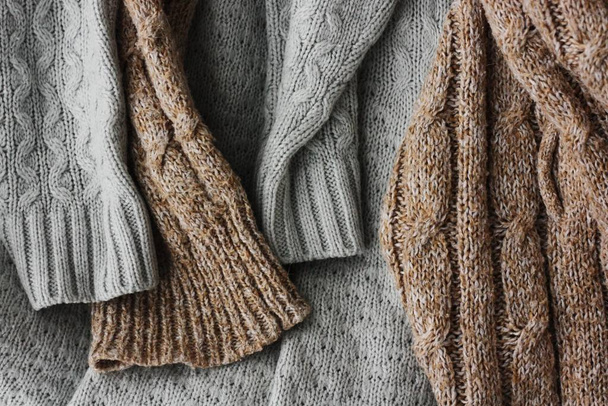 Beautiful knitted grey and brown sweaters macro - Foto, Imagen