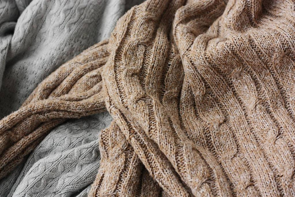 Beautiful knitted grey and brown sweaters macro  - Valokuva, kuva