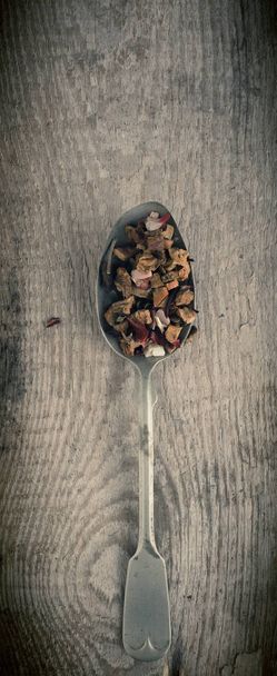 Colorful Sencha tea on an old spoon - Photo, Image