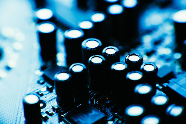 computer board capacitors blue color close up. - Photo, Image