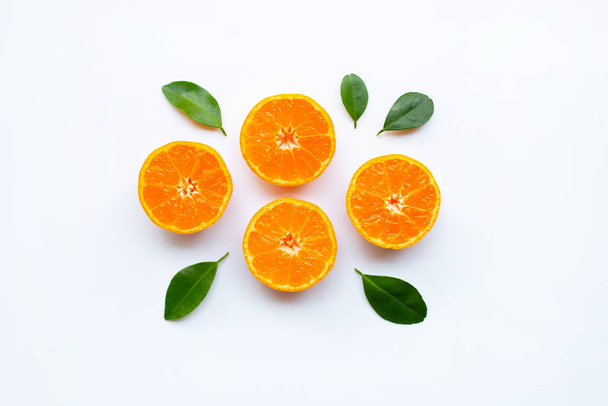Orange fruits with leaves on white background. Top view - Fotoğraf, Görsel