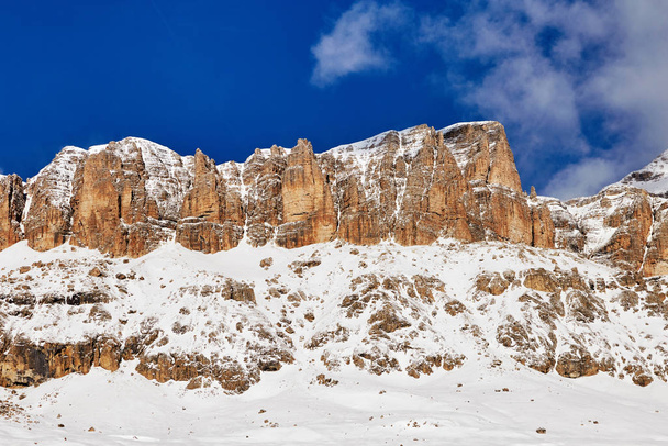 The Sassolungo Group massif covered in snow in Dolomites. Italy beauties - Foto, Bild