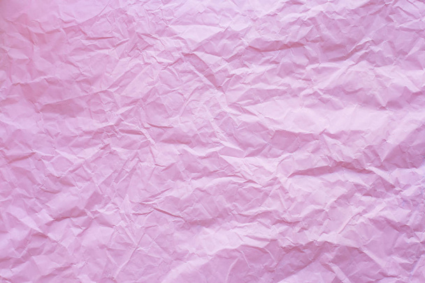 Pink crumpled recycle paper background - Photo, image