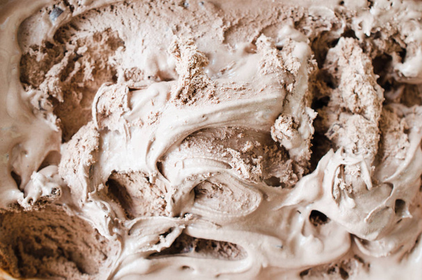 Texture of melting chocolate ice cream. Brown background, close up - Fotografie, Obrázek