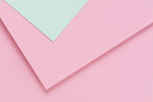 Fundo de textura de papel colorido abstrato. Formas geométricas mínimas e linhas em tons rosa pastel e verde claro - Foto, Imagem