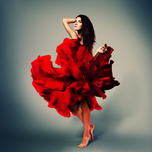 beautiful romantic girl in red flower dress with long broun hair - Photo, Image