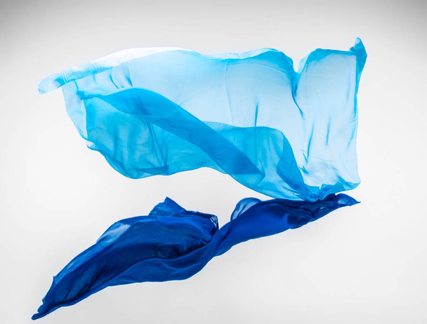 abstract piece of blue fabric flying, high-speed studio shot - Photo, Image